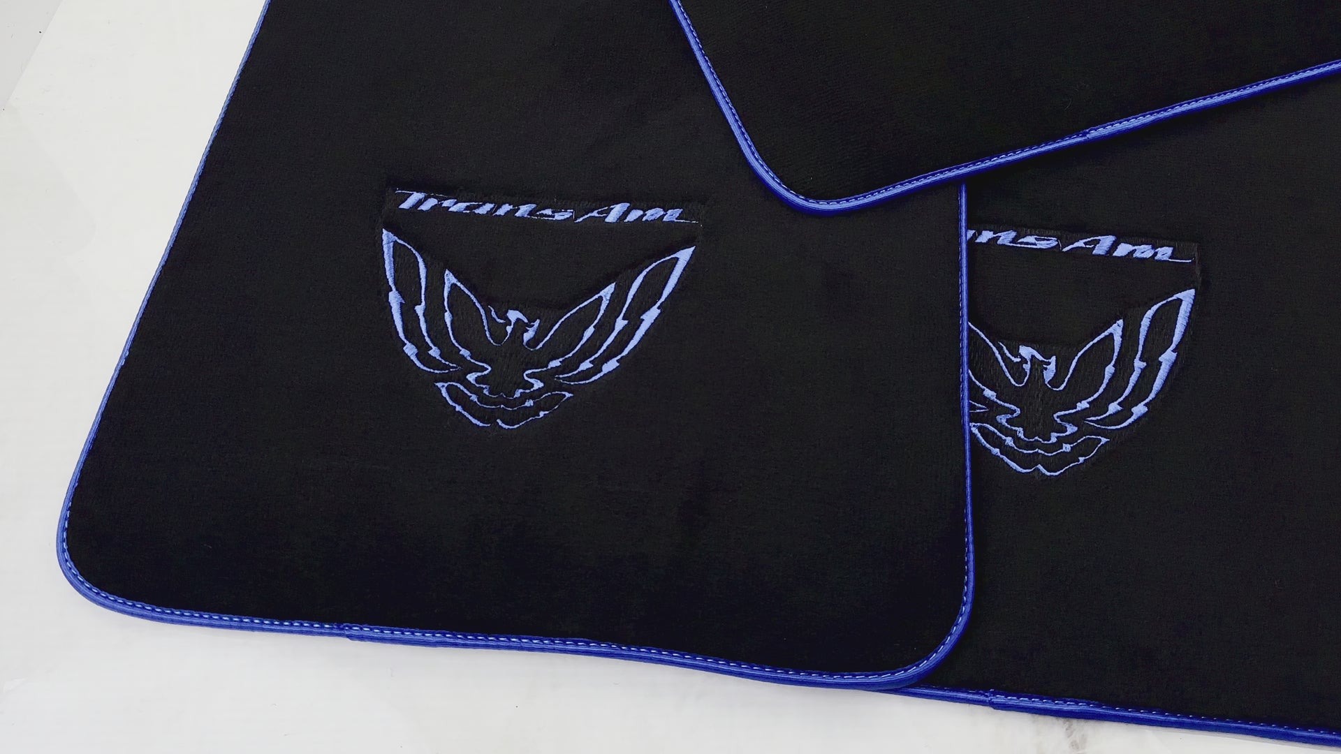 Alfombrillas de coche negras con ribete azul para Pontiac FireBird de tercera generación (1982-1992) con logotipo Trans Am - AutoWin